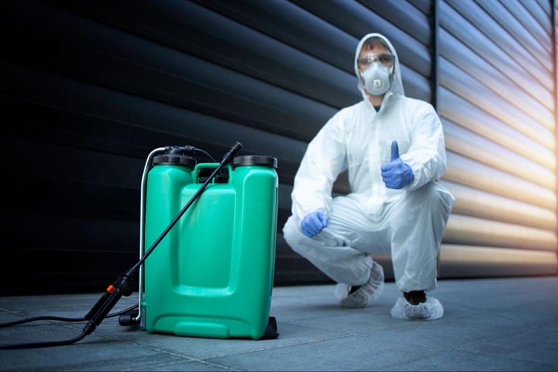 exterminator white protective uniform
